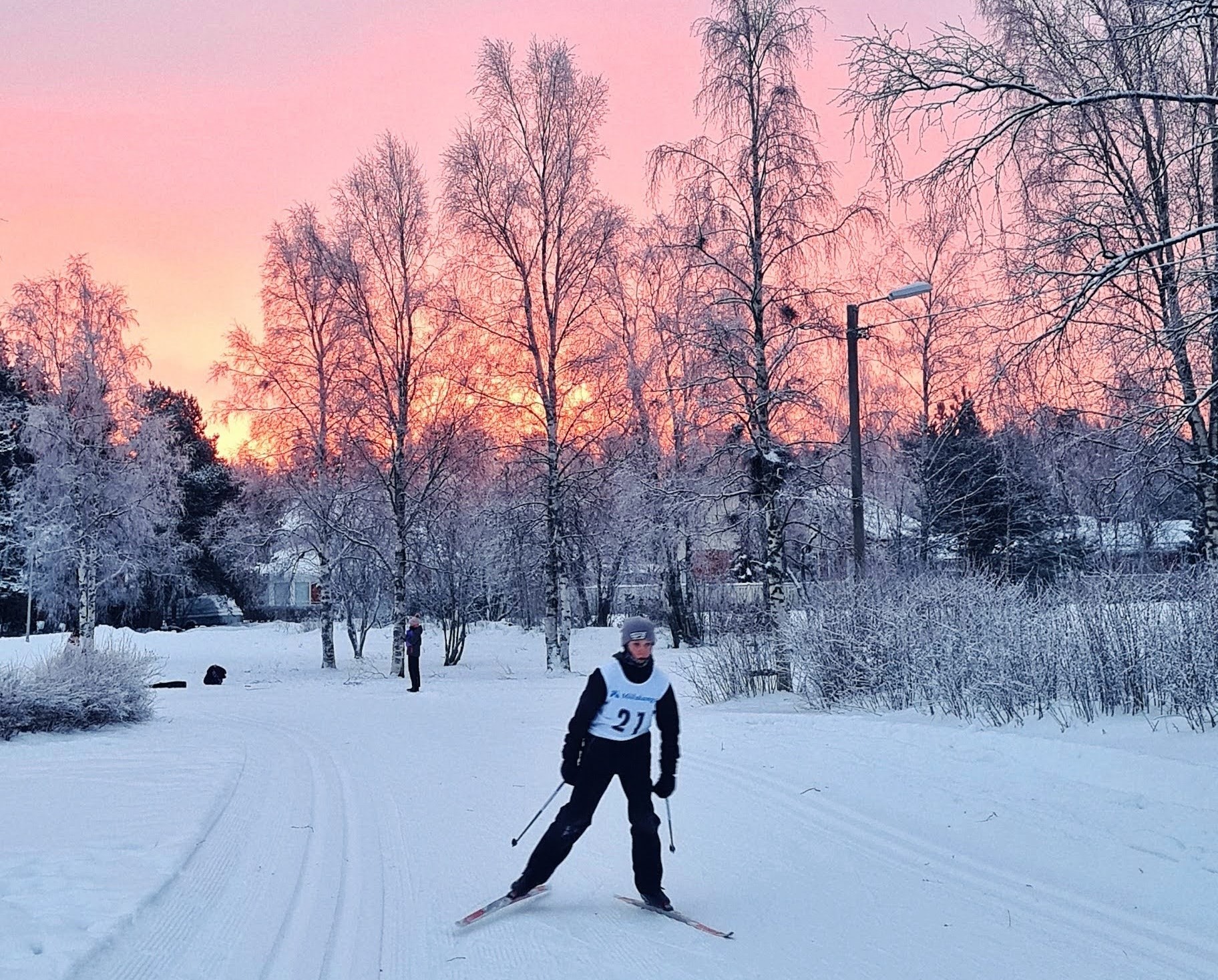 A child skiing on a wintry Raahe ski trail.